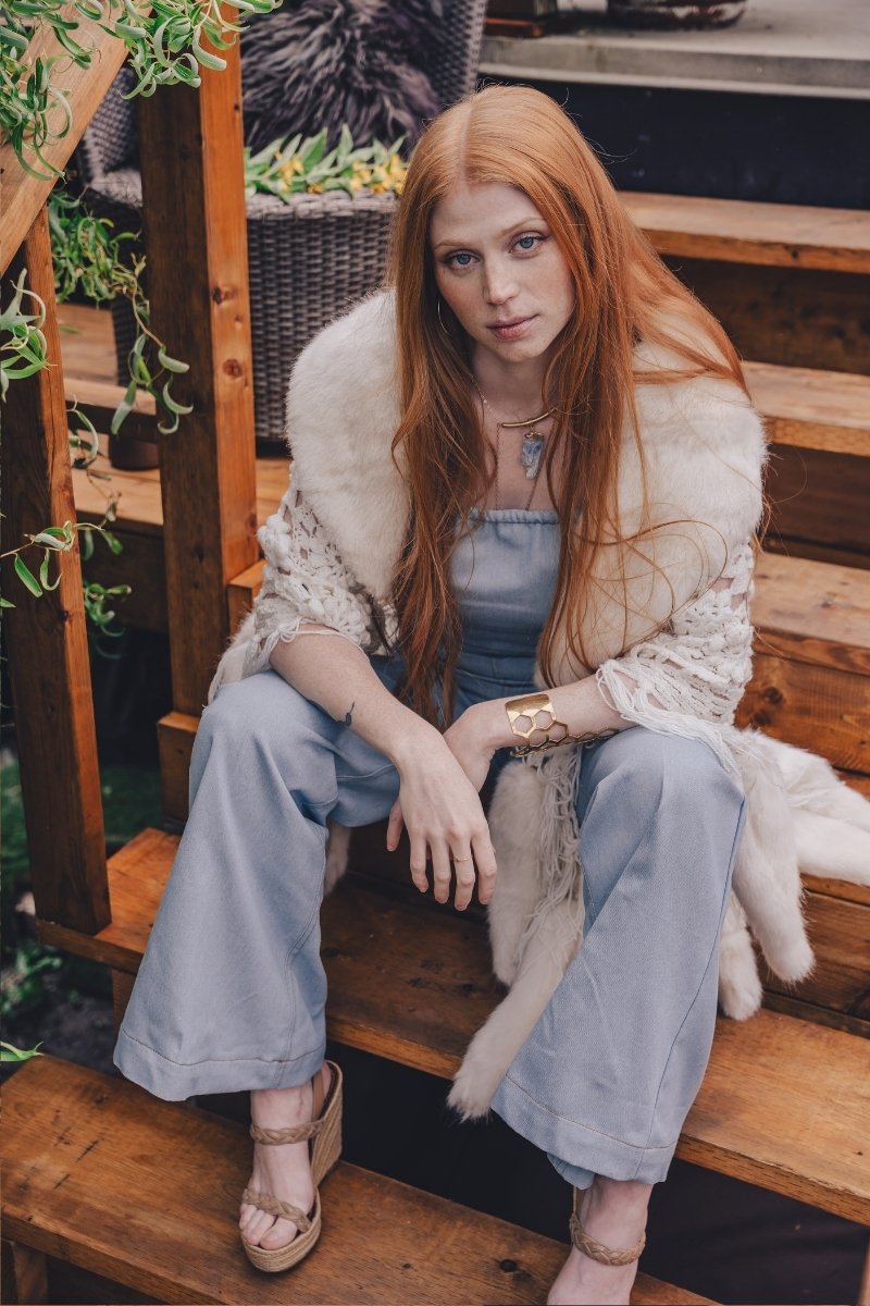  vintage style denim jumpsuit capturing 70s fashion vibes designed by Thor sister since 1969 for bold confident women