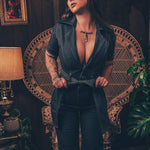 Lola Love stretch denim bell bottom  jumpsuit with belted waist, front pockets, and a bold 70's inspired silhouette for effortless retro cool by soul sister since 1969