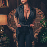 Lola Love stretch denim bell bottom  jumpsuit with belted waist, front pockets, and a bold 70's inspired silhouette for effortless retro cool by soul sister since 1969