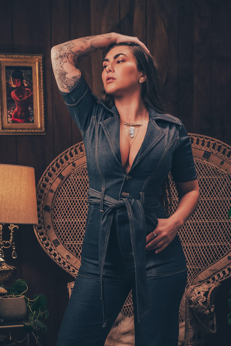 Lola Love stretch denim bell bottom  jumpsuit with belted waist, front pockets, and a bold 70's inspired silhouette for effortless retro cool by soul sister since 1969