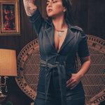 Lola Love stretch denim bell bottom  jumpsuit with belted waist, front pockets, and a bold 70's inspired silhouette for effortless retro cool by soul sister since 1969