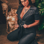 Lola Love stretch denim bell bottom  jumpsuit with belted waist, front pockets, and a bold 70's inspired silhouette for effortless retro cool soul sister since 1969