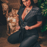 Lola Love stretch denim bell bottom  jumpsuit with belted waist, front pockets, and a bold 70's inspired silhouette for effortless retro cool soul sister since 1969