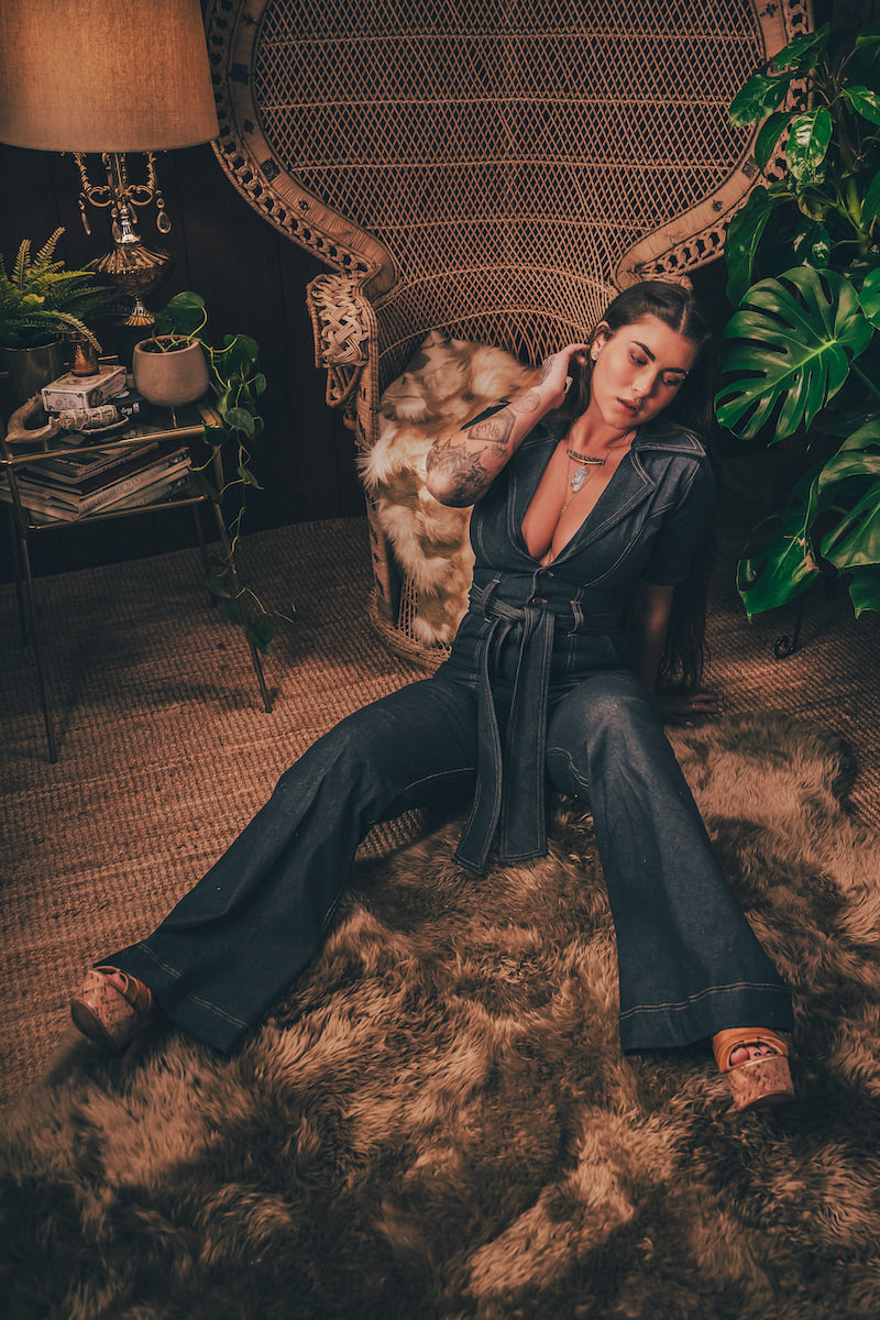 Lola Love stretch denim bell bottom  jumpsuit with belted waist, front pockets, and a bold 70's inspired silhouette for effortless retro cool by soul sister since 1969