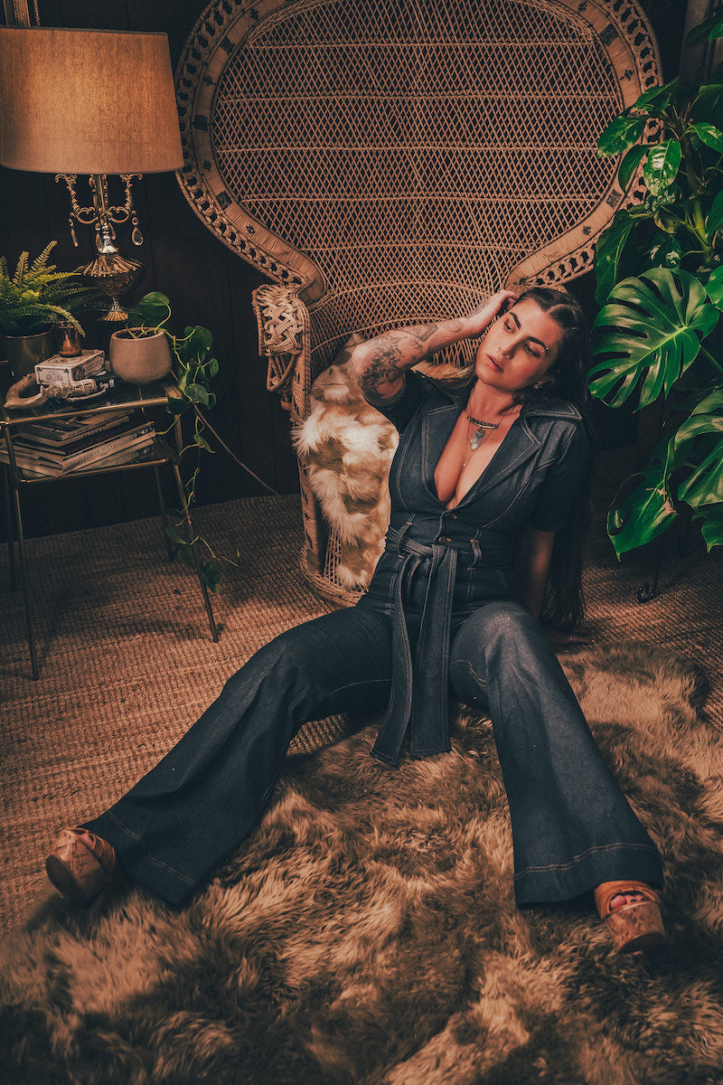 Lola Love stretch denim bell bottom  jumpsuit with belted waist, front pockets, and a bold 70's inspired silhouette for effortless retro cool by soul sister since 1969