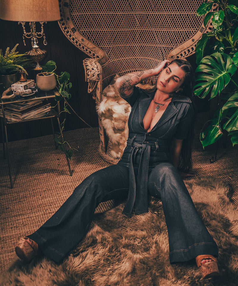 Lola Love stretch denim bell bottom  jumpsuit with belted waist, front pockets, and a bold 70's inspired silhouette for effortless retro cool by soul sister since 1969