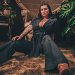 Lola Love stretch denim bell bottom  jumpsuit with belted waist, front pockets, and a bold 70's inspired silhouette for effortless retro cool by soul sister since 1969