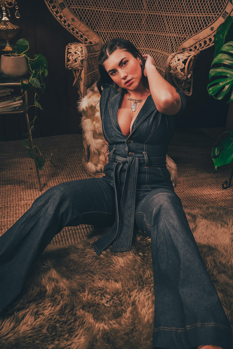Lola Love stretch denim bell bottom  jumpsuit with belted waist, front pockets, and a bold 70's inspired silhouette for effortless retro cool by soul sister since 1969