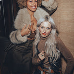 Two groovy women modelling for soul sister since 1969 wearing groovy threads made with rebellion straight out of the 1970s Hollywood film