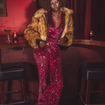 our soul sister muse wars an iconic studio'54 disco party lookHollywood worthy in her aux fur bomber coat inspired by 190s fashion