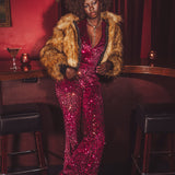 our soul sister muse wars an iconic studio'54 disco party lookHollywood worthy in her aux fur bomber coat inspired by 190s fashion