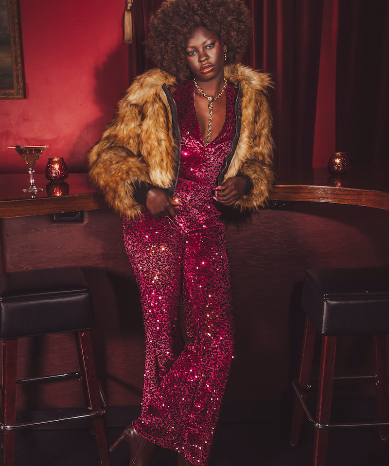 our soul sister muse wars an iconic studio'54 disco party lookHollywood worthy in her aux fur bomber coat inspired by 190s fashion