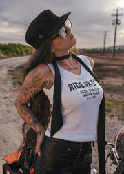 Woman wearing a 'Ride or Die' tank top in an outdoor setting wearing soul sister since 1969